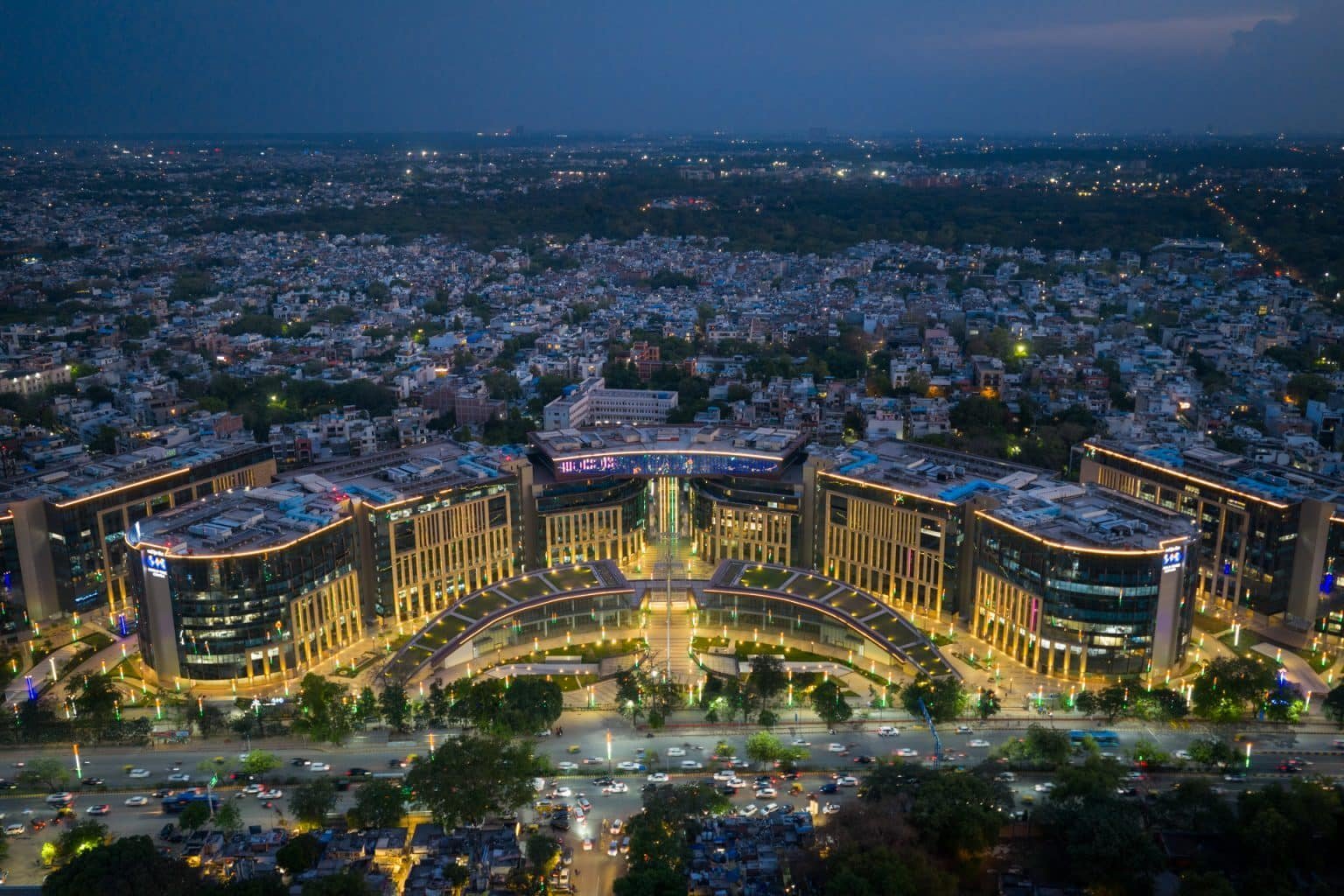 Illustrative aerial view of a commercial complex at night